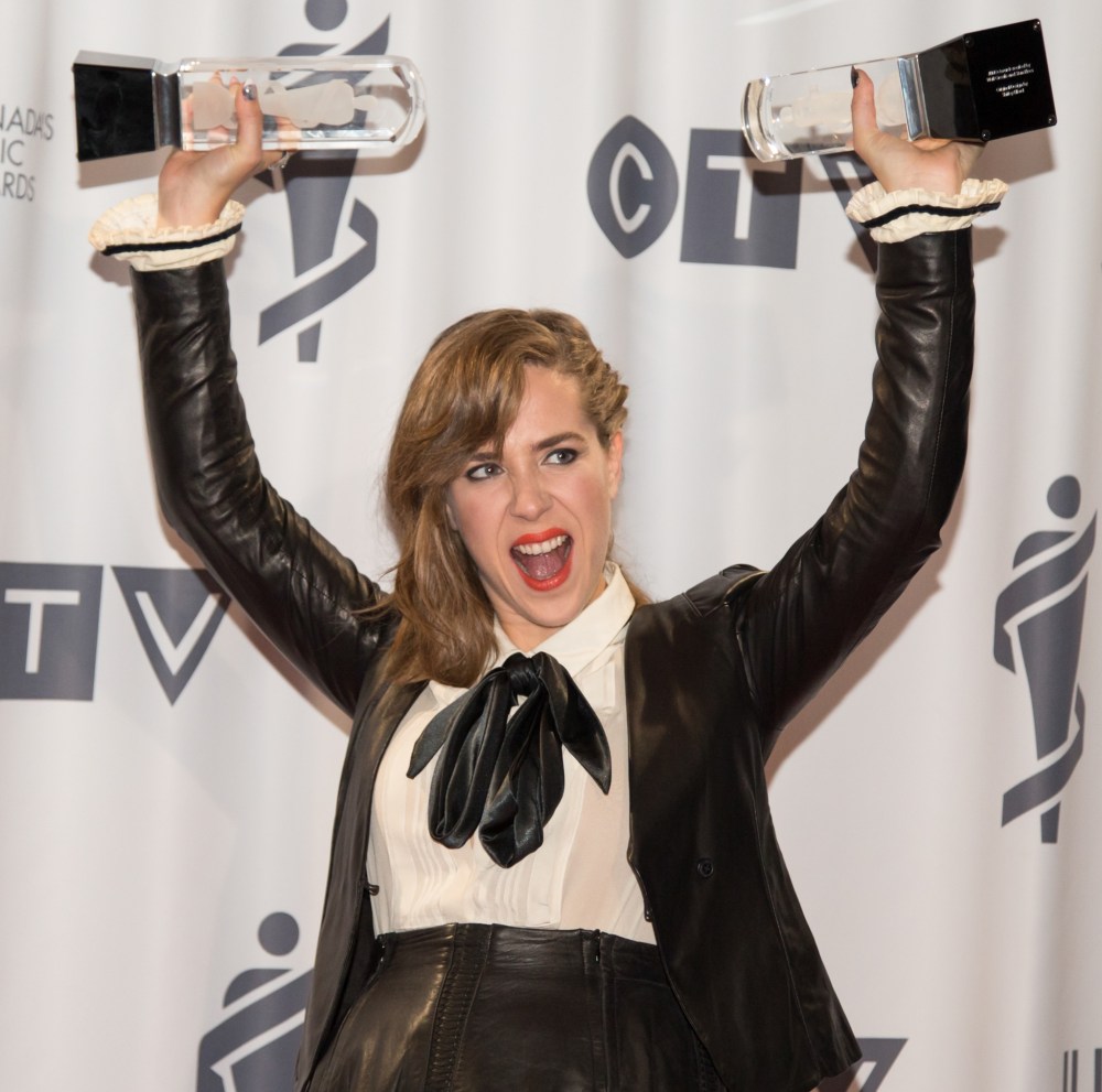 Crystal Schick / Winnipeg Free Press
Serena Ryder with her two JUNOs, Songwriter of the Year and Artist of the Year, at the 2014 JUNOs at the MTS Centre in Winnipeg on March 30, 2014.