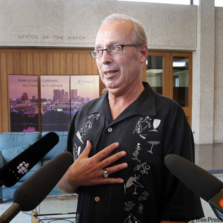 WAYNE.GLOWACKI@FREEPRESS.MB.CA
Winnipeg Mayor Sam Katz talks about the city's role in the new stadium proposal at city hall Tuesday.