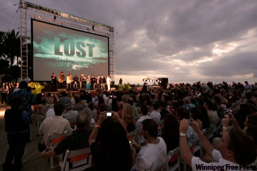 Marco Garcia / AP Photo
Beach goers are seen at the Lost Premiere on Waikiki Beach, Saturday, Jan. 30, 2010 in Honolulu.   Lost, which is filmed in Hawaii, returns to television for its sixth and final season Tuesday.