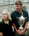 BEBETO MATTHEWS / THE ASSOCIATED PRESS
Lucas Glover, with wife Jennifer, holds his U.S. Open trophy on a visit Tuesday to New York’s Empire State Building.
