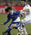 THANASSIS STAVRAKIS / THE ASSOCIATED PRESS
Argentina superstar Lionel Messi (left) is a step ahead of Greece’s Vassilis Torosidis during their Group B game Tuesday.