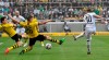 Dortmund's Thomas Delaney and Lukasz Piszczek defend a shot by Moenchengladbach's Thorgan Hazard, from left, during the German Bundesliga soccer match between Borussia Moenchengladbach and Borussia Dortmund in Moenchengladbach, Germany, Saturday, May 18, 2019. (AP Photo/Martin Meissner)
