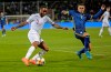 England's Raheem Sterling, left, and Kosovo's Milot Rashica challenge for the ball during the Euro 2020 group A qualifying soccer match between Kosovo and England at Fadil Vokrri stadium in Pristina, Kosovo, Sunday, Nov. 17, 2019. (AP Photo/Visar Kryeziu)