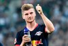 Leipzig's Timo Werner reacts to fans after scoring three goals in the German Bundesliga soccer match between Borussia Moenchengladbach and RB Leipzig in Moenchengladbach, Germany, Friday, Aug. 30, 2019. (AP Photo/Martin Meissner)