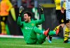 Dortmund goalkeeper Roman Buerki reacts during the German Bundesliga soccer match between Borussia Dortmund and TSG 1899 Hoffenheim in Dortmund, Germany, Saturday, Feb. 9, 2019. (AP Photo/Martin Meissner)