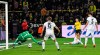 Dortmund's Jadon Sancho, 2nd from right, scores the opening goal against Moenchengladbach goalkeeper Yann Sommer, left, during the German Bundesliga soccer match between Borussia Dortmund and Borussia Moenchengladbach in Dortmund, Germany, Friday, Dec. 21, 2018. (AP Photo/Martin Meissner)