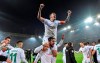Bremen's Max Kruse, up, celebrates on the shoulders of Bremen's Martin Harnik after winning the German soccer cup, DFB Pokal, match between Borussia Dortmund and Werder Bremen in Dortmund, Germany, Tuesday, Feb. 5, 2019. Dortmund was defeated by Bremen with 5-7 after penalty shootout. (AP Photo/Martin Meissner)