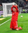 Bayern's Robert Lewandowski celebrates after he scored his side's third goal during the German Bundesliga soccer match between Borussia Moenchengladbach and FC Bayern Munich in Moenchengladbach, Germany, Saturday, March 2, 2019. (AP Photo/Martin Meissner)