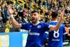 Schalke's Daniel Caligiuri celebrates after he scored his side's third goal during the German Bundesliga soccer match between Borussia Dortmund and FC Schalke 04 in Dortmund, Germany, Saturday, April 27, 2019. (AP Photo/Martin Meissner)