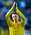 Dortmund's Marco Reus claps hands after the German Bundesliga soccer match between Borussia Moenchengladbach and Borussia Dortmund in Moenchengladbach, Germany, Saturday, May 18, 2019. Dortmund finished the season on the second place behind Bayern Munich. (AP Photo/Martin Meissner)