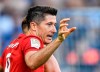 Bayern's Robert Lewandowski reacts during the German Bundesliga soccer match between FC Schalke 04 and Bayern Munich in Gelsenkirchen, Germany, Saturday, Aug. 24, 2019. (AP Photo/Martin Meissner)