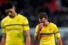 Dortmund midfielder Mario Gotze, right, reacts after losing the Champions League round of 16, first leg, soccer match between Tottenham Hotspur and Borussia Dortmund at Wembley stadium in London, England, Wednesday, Feb. 13, 2019. (AP Photo/Frank Augstein)