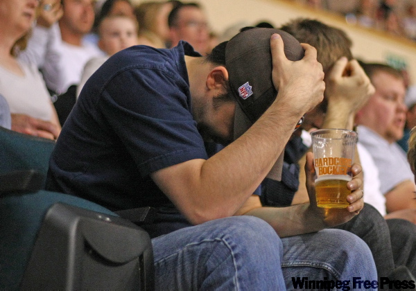 TREVOR.HAGAN@ FREEPRESS.MB.CA
A Manitoba Moose fan reacts in disbelief after the Hershey Bears score their third goal in the first period.