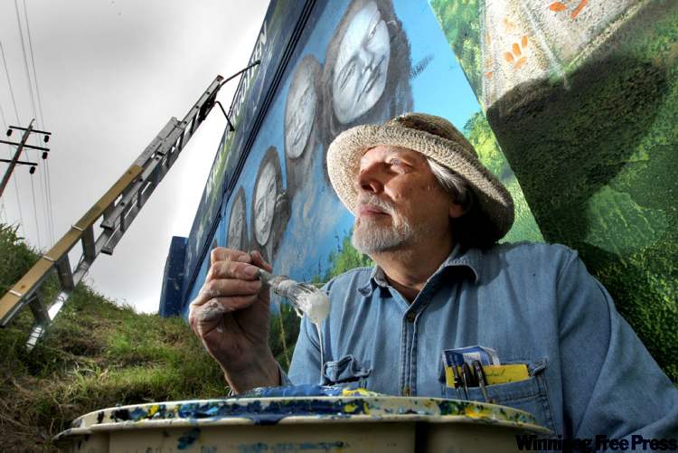 RUTH BONNEVILLE / WINNIPEG FREE PRESS
Artist Tom Andrich next to his latest mural on the Empress Street overpass, of missing and murdered Aboriginal women.