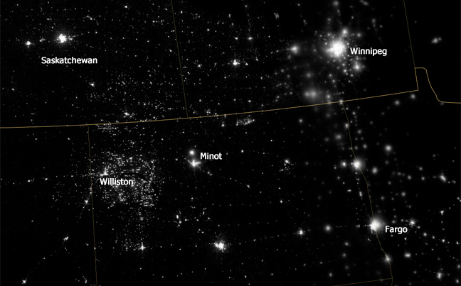NASA Earth Observatory
A nighttime view of northwestern North Dakota on Nov. 12, 2012, shows bright specks of light associated with drilling equipment and temporary housing near drilling sites. NASA Earth Observatory image by Jesse Allen and Robert Simmon, using VIIRS Day-Night Band data from the Suomi National Polar-orbiting Partnership.