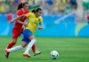 FILE - In this Aug. 19, 2016, file photo, Brazil's Marta, left, dribbles past Canada's Jessie Fleming during the bronze medal women' soccer match at the summer Olympic's at the Arena Corinthians stadium in Sao Paulo. (AP Photo/Nelson Antoine, File)