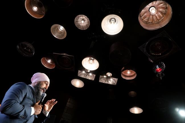 NDP Leader Jagmeet Singh responds to questions from reporters at a record label company in Toronto on Tuesday, October 8, 2019. THE CANADIAN PRESS/Paul Chiasson