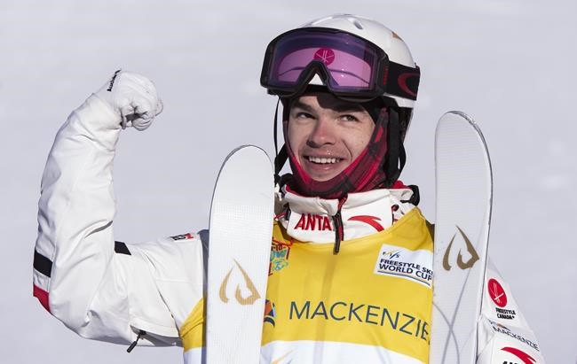 Canada's Mikael Kingsbury celebrates his victory at the FIS Freestyle Ski moguls World Cup in Mont Tremblant, Que. on Saturday, January 26, 2019. THE CANADIAN PRESS/Paul Chiasson