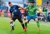 Montreal Impact midfielder Saphir Taider, left, and Seattle Sounders midfielder Alex Roldan battle for the ball during first half MLS action in Montreal on Wednesday, June 5, 2019. THE CANADIAN PRESS/Paul Chiasson