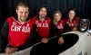 Team members Jesse Lumsden, Chris Spring, Chelsea Valois and Jenny Ciochetti, left to right, pose during the announcement of the Canadian bobsled team for the 2014 Olympic Winter Games in Sochi, Monday, December 16, 2013 in Montreal. There were several similarities between football and bobsled that drew former CFL running back Lumsden to the ice from the gridiron.THE CANADIAN PRESS/Paul Chiasson