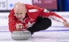 Canada skip Kevin Koe delivers a shot as they face South Korea at the world men's curling championship in Lethbridge on Saturday, March 30, 2019. THE CANADIAN PRESS/Paul Chiasson
