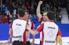 Switzerland skip Peter de Cruz, lead Valentin Tanner, second Sven Michel and fourth Benoit Schwarz, left to right celebrate their victory over Japan in the bronze medal game at the Men's World Curling Championship in Lethbridge, Alta. on Sunday, April 7, 2019. THE CANADIAN PRESS/Paul Chiasson
