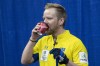 Sweden skip Niklas Edin has a sip of coffee during a break in play at the Men's World Curling Championship in Lethbridge, Alta. on Monday, April 1, 2019. THE CANADIAN PRESS/Paul Chiasson
