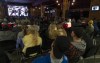 Fans crowd into a bar to watch the Lethbridge Hurricanes play the Calgary Hitmen in game seven WHL playoff action in Lethbridge, Alta. on Tuesday, April 2, 2019. THE CANADIAN PRESS/Paul Chiasson