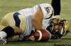 REUTERS
Winnipeg Blue Bombers quarterback Buck Pierce is slow to get up after being tackled by the Toronto Argonauts during the first half of their CFL football game in Toronto September 24, 2011.