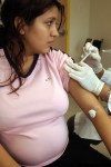 RON HEFLIN / The Associated Press Archives
A pregnant woman receives a seasonal flu shot in this file photo.