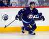 BORIS MINKEVICH / WINNIPEG FREE PRESS
The Jets' Michael Frolik gets in on the second-period action Thursday.
