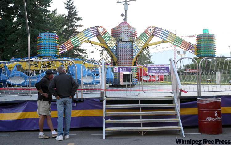 Stuart Gradon / Canwest News Service
The midway ride involved in an accident that resulted in multiple injuries at the Calgary Stampede on Friday, July 16, 2010.