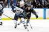 CHRIS O'MEARA / THE ASSOCIATED PRESS
Winnipeg Jets left wing Nikolaj Ehlers (27) moves the puck in front of Tampa Bay Lightning left wing Ondrej Palat (18) during the second period of an NHL hockey game Saturday, Nov. 16, 2019, in Tampa, Fla.