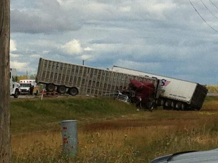 Driver critically injured after crashing into fire truck on Trans ...