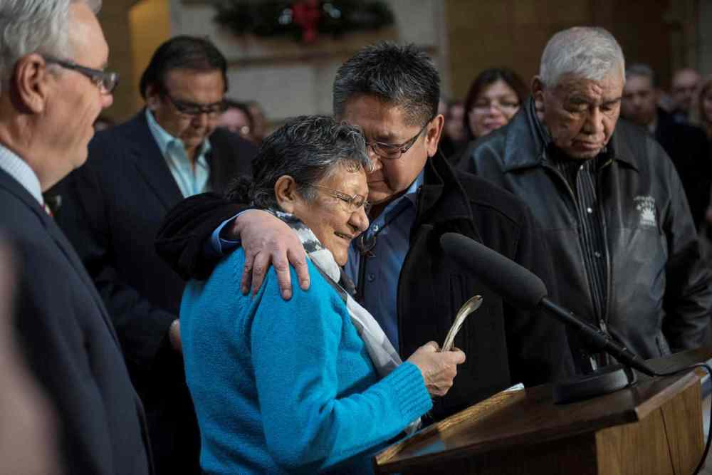 David Lipnowski / Winnipeg Free Press
Elder Lilian Henry and Chief Erwin Redsky of Shoal Lake 40 First Nation embrace during the joint funding announcement at the Manitoba Legislature on Thursday.