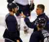 Boris Minkevich / Winnipeg Free Press
Jim Slater talks to head coach Claude Noel at a Friday workout. Slater was none too pleased with Thursday's performance against the Wild.