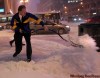 WAYNE GLOWACKI / WINNIPEG FREE PRESS
Manfred Hirschfeld shovels the entrance way of the Royal Bank on Portage Avenue downtown this morning after  an overnight snowfall.