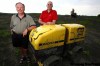 TREVOR.HAGAN@FREEPRESS.MB.CA
Brent Kerslake (left), Mike Kenney of Southwood Golf and Country Club lean on a compactor used to help transform flat prairie into a sculpted, rolling golf course.