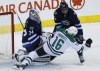 John Woods / WINNIPEG FREE PRESS
Winnipeg Jets' Dustin Byfuglien (33) takes down Dallas Stars' Ryan Garbutt (16) in front of Jets goaltender Michael Hutchinson (34) during first period.
