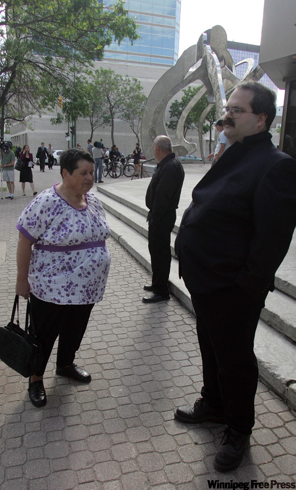 KEN GIGLIOTTI / WINNIPEG FREE PRESS 
Canadian Association for Free Expression supporters were at the Courthouse to observe a  court case involving a young child. CAFE supporters (left) Margaret Feakes and (right) Gerry Neal stand outside the Manitoba Law Courts. They were not allowed in to the proceedings as the hearings are closed to the public.