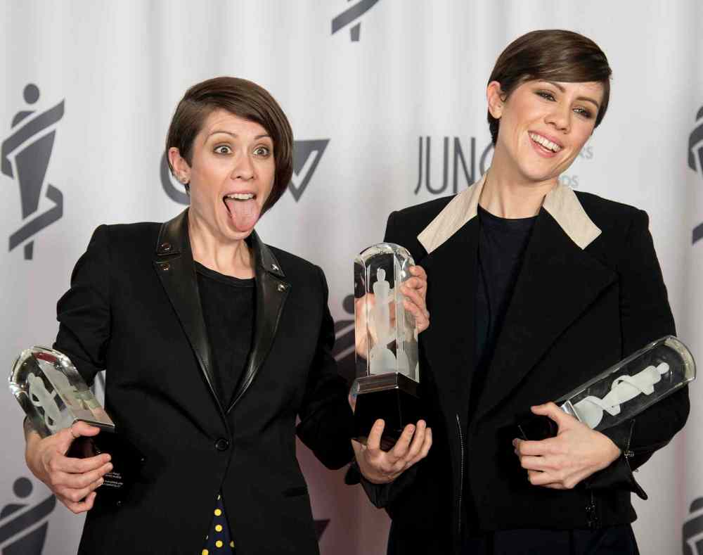 Jonathan Hayward / The Canadian Press
Tegan and Sara celebrate winning three Juno Awards for Pop Album of the Year, Group of the Year and Single of the Year.