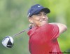 Mark Duncan / AP Photo
Tiger Woods tees off on the fourth hole during the final round of the Bridgestone Invitational golf tournament Sunday, Aug. 9, 2009, at Firestone Country Club in Akron, Ohio.