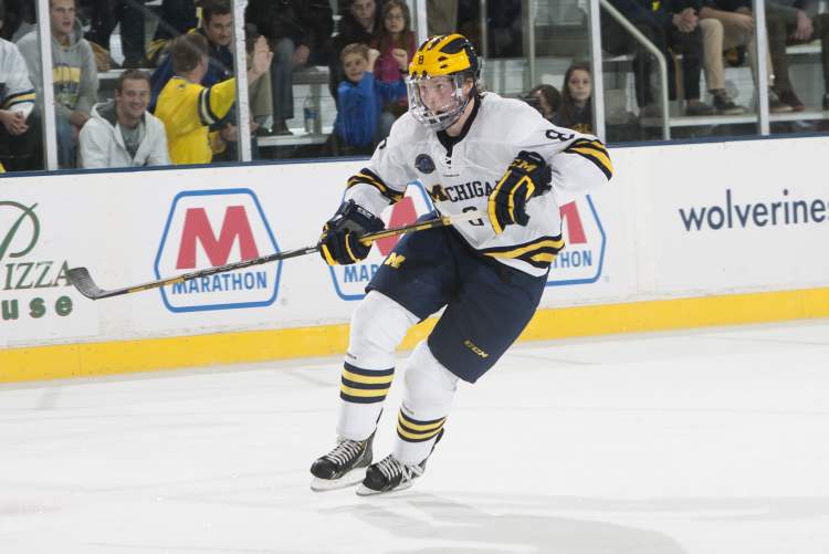 University of Michigan handout
Jacob Trouba is debating the pros and cons of going pro.