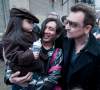 David Lipnowski / Winnipeg Free Press
Bono greets fans at the back entrance of the Burton Cummings Theatre Friday afternoon. Bono and the band took time to shake hands, sign autographs, hug fans, and pose for photos after coming straight from the airport. U2 is performing at Canad Inns Stadium Sunday night as part of their U2 360 world tour.