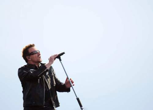 DAVID LIPNOWSKI / WINNIPEG FREE PRESS
U2 lead singer Bono performs with U2 in concert at Canad Inns Stadium last Sunday night.