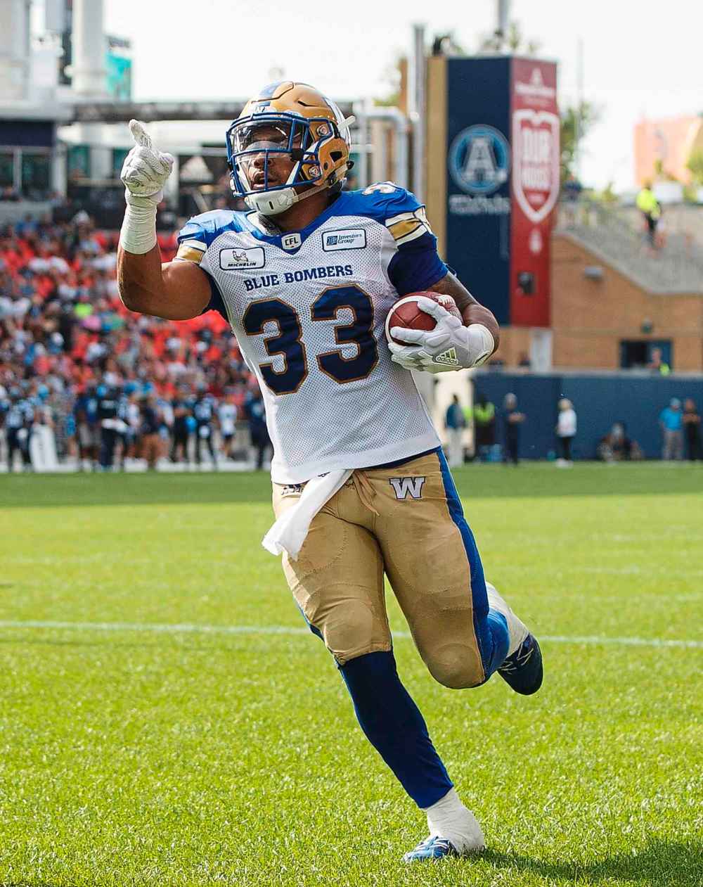 Winnipeg Blue Bombers' Andrew Harris celebrates a touchdown during first half CFL football action against the Toronto Argonauts, in Toronto on Saturday, July 21, 2018.