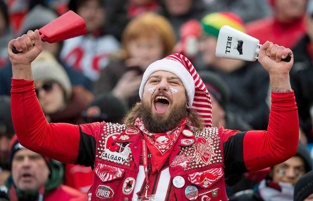 TODD KOROL / THE CANADIAN PRESS
A Calgary Stampeders' fan cheers during first half CFL West Final football action against the Winnipeg Blue Bombers in Calgary, Sunday, Nov. 18, 2018
