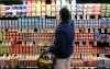 It is almost impossible not to buy Canadian yogurt in the grocery store. (Jeff Chiu / The Associated Press files)