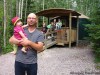 Bill Redekop / Winnipeg Free Press
Dad Neil, holding Molly, and Patrick, Owen, Colin, mom Mindy and Mikey (from left) savour their woodland vacation getaway.