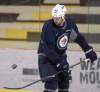 JOE BRYKSA / WINNIPEG FREE PRESS 
Zach Bogosian was a welcome sight to fans as he skated at the MTS Iceplex this morning while wearing his Jets sweater.